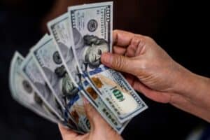 Egypt, IMF reach tentative deal on exchange rate adjustment: Sources